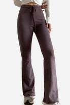 Comfy wide-leg pants in sustainable breathable fabric with flared style and elastic waistband.