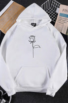 White oversized hoodie with minimalist graffiti rose print and front pocket