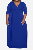 Plus size dress with belt in royal blue featuring deep V-neck and 3/4 sleeves