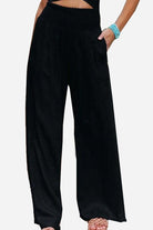 black high-waist cotton linen palazzo pants with wide legs and pockets