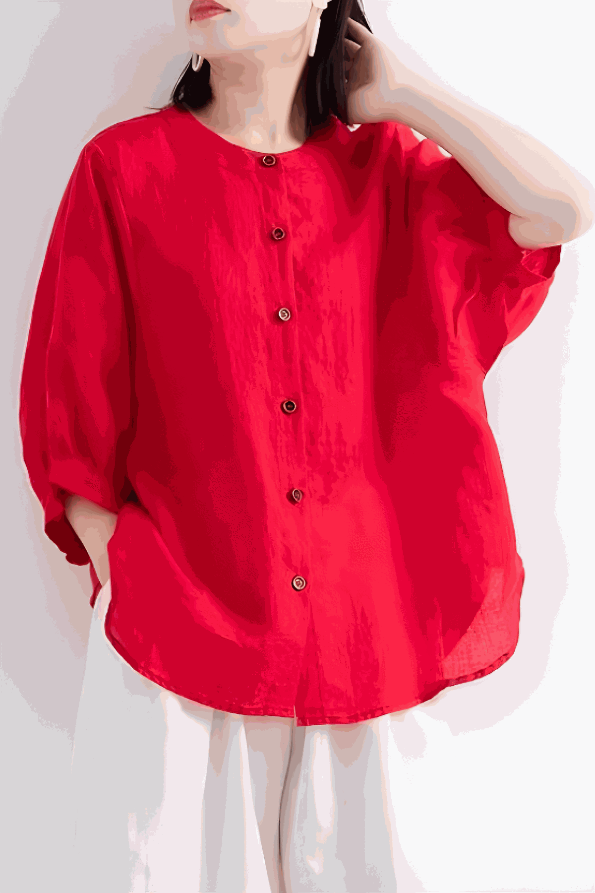 Relaxed loose breathable linen blouse in vibrant red with button-down front and three-quarter sleeves