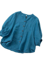 Relaxed loose breathable linen blouse in vibrant blue with button-down front and soft fabric for summer comfort