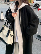 Everyday wear oversized sherpa long coat in black with cozy plush lining and relaxed fit style