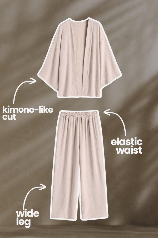 Chic Comfort Kimono two-piece set featuring kimono-like cut top, elastic waist pants, and wide leg design in soft beige fabric
