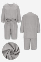 Gray two-piece set with loose long-sleeve shirt and high-waisted knee-length shorts in soft breathable cotton fabric