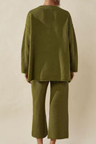 Multi-Weather Comfort two-piece oversized set in olive green with relaxed fit and textured fabric.