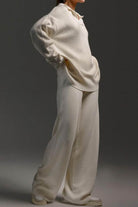 Plush & Preppy Camel two-piece set featuring a cozy knit pullover with polo collar and wide-leg pants in camel color for travel and casual wear.