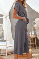Gray V-neck lace-up wide-leg jumpsuit with tie waist and pockets for women