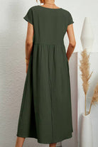 back view of capped-sleeve voluminous pleated midi dress in olive green