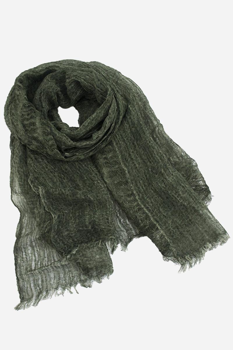 Dark green lightweight linen scarf with frayed edges, soft and breathable fabric, versatile for multiple styling options.