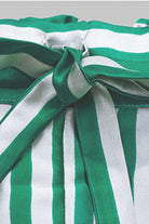 Green and white striped mulberry silk pajama pants with a tied waistband detail
