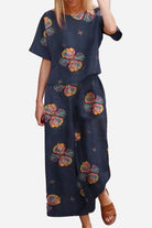 Linen and cotton loose two-piece set with floral print, short sleeves top, and wide-leg pants in navy blue