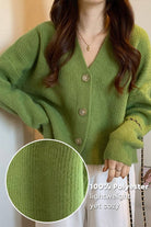 Green casual loose boxy cardigan made of 100% polyester with ribbed texture and oversized fit