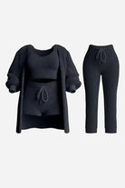 Cloud Soft 4-Piece collection black soft-touch knit set with cardigan, tank top, shorts, and pants