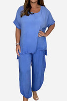 Relaxed linen-like travel 2-piece set in blue with loose fit top and wide-leg pants for comfortable stylish travel wear