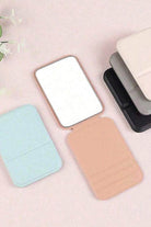 Compact Travel Pocket Mirror with PU leather cover in various colors for stylish, durable, and portable personal use.