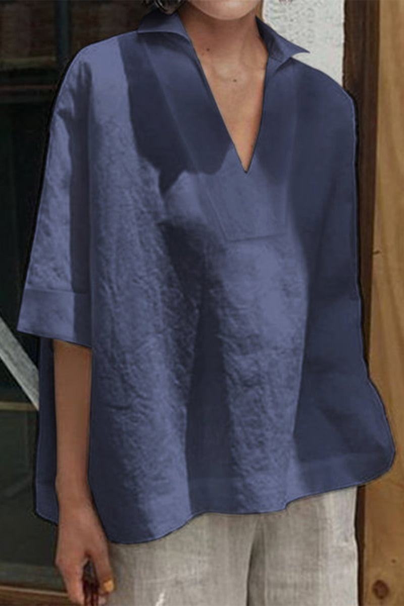 Woman wearing a relaxed fit Cotton-Linen V-Neck shirt in navy blue with half sleeves and a breathable fabric blend.