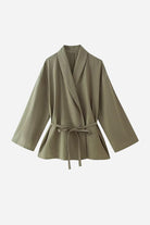 Olive green wide-leg top from Mix-Match Lounge-to-Travel Set with belted waist and relaxed fit