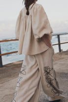 Dolce Vita Cotton Linen floral set with balloon sleeves and wide-leg pants in beige breathable fabric