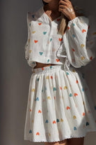 Sweet Countryside 100 Cotton ruffled two-piece set with colorful heart prints, breathable cotton fabric, and relaxed fit.