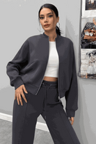 The Voyager Zip Set women's matching charcoal zip-front sweatshirt and wide-leg joggers travel outfit