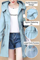 Cityscape Comfort Hooded Windbreaker in light blue with plush lining, hooded design, figure-flattering fit, and large front pockets.