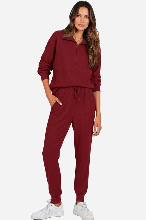 Unisex half-zip pullover and sweatpants set in burgundy, lightweight polyester blend, casual and comfortable loungewear for men and women