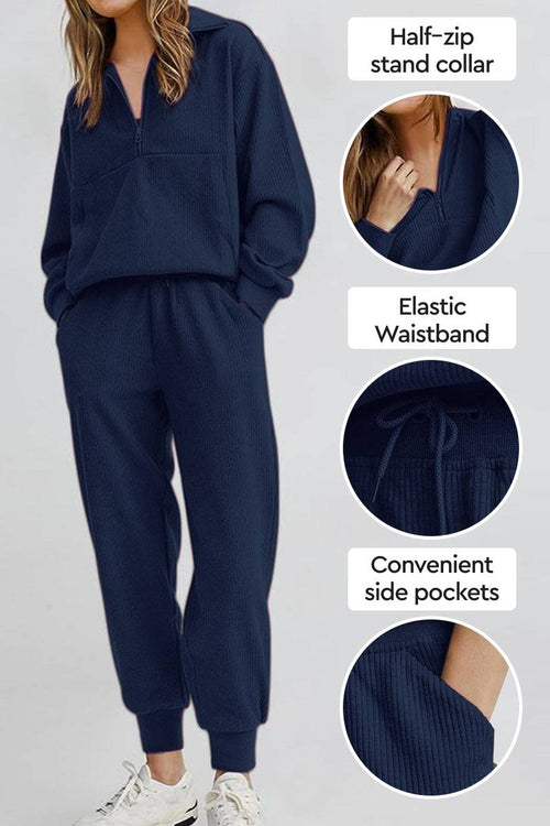 Unisex half-zip pullover and sweatpants set in navy with stand collar, elastic waistband, and side pockets