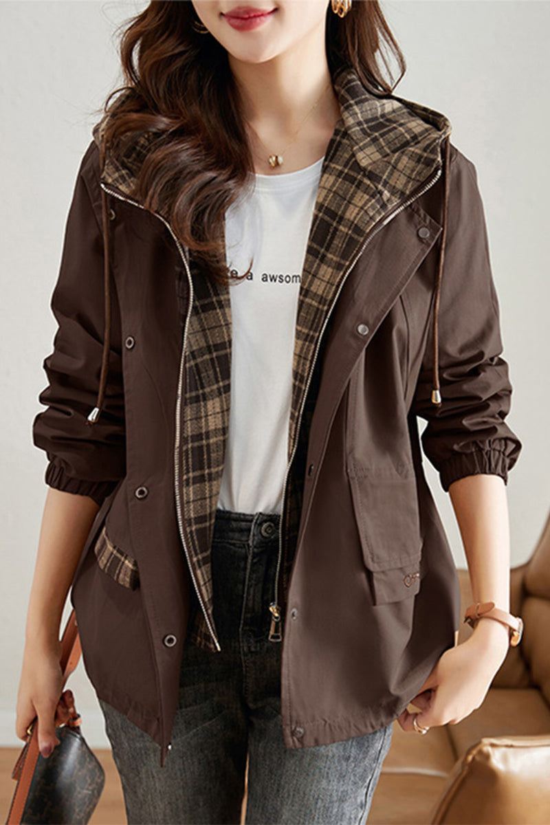 City Explorer Plaid Windbreaker for women with wind-resistant shell, plaid lining, adjustable hood, and elastic cuffs in brown.