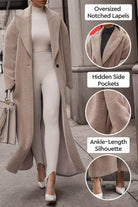 Beige oversized teddy coat with notched lapels, hidden side pockets, and ankle-length silhouette worn over white outfit