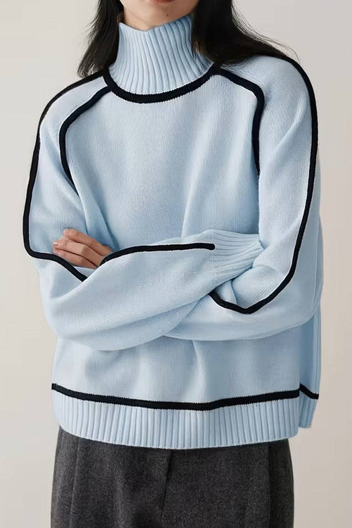 Light blue Zero Itch Turtleneck Sweater with black contrast trim, soft knit, relaxed modern fit, and slimming silhouette