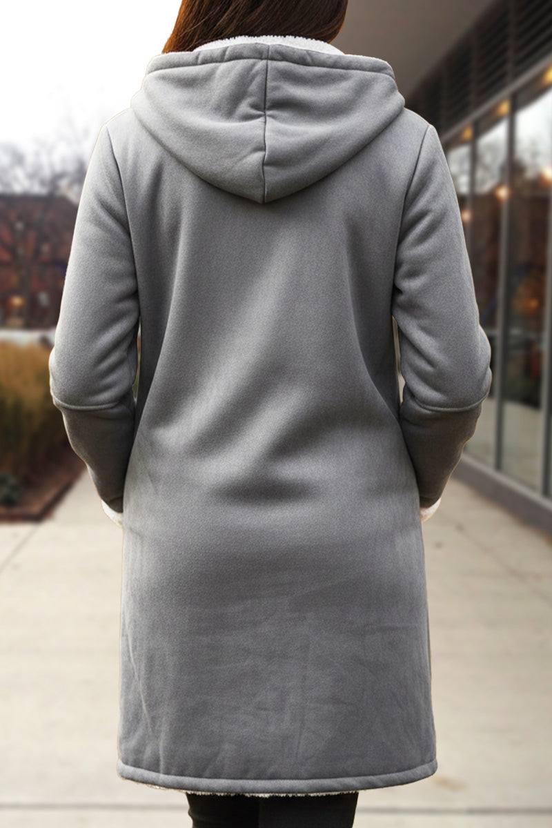 gray warm toggle button hooded coat with sherpa lining on model outdoors