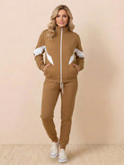 Colorblock Comfort Tracksuit with contrast curved panels and relaxed fit for effortless style and comfort