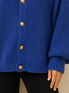 Oversized button-front knit cardigan with balloon sleeves and gold-tone buttons