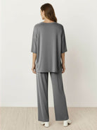 Oversized long-line loungewear set with short-sleeve pullover and wide-leg pants in soft knit fabric