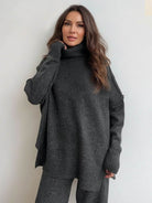 Woman wearing soft-knit turtleneck two-piece set with relaxed fit and wide-leg pants