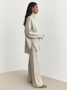 Soft-knit turtleneck two-piece with relaxed fit and wide-leg pants