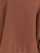 Cropped textured baseball jacket with full zipper and elastic cuffs, styled for casual wear