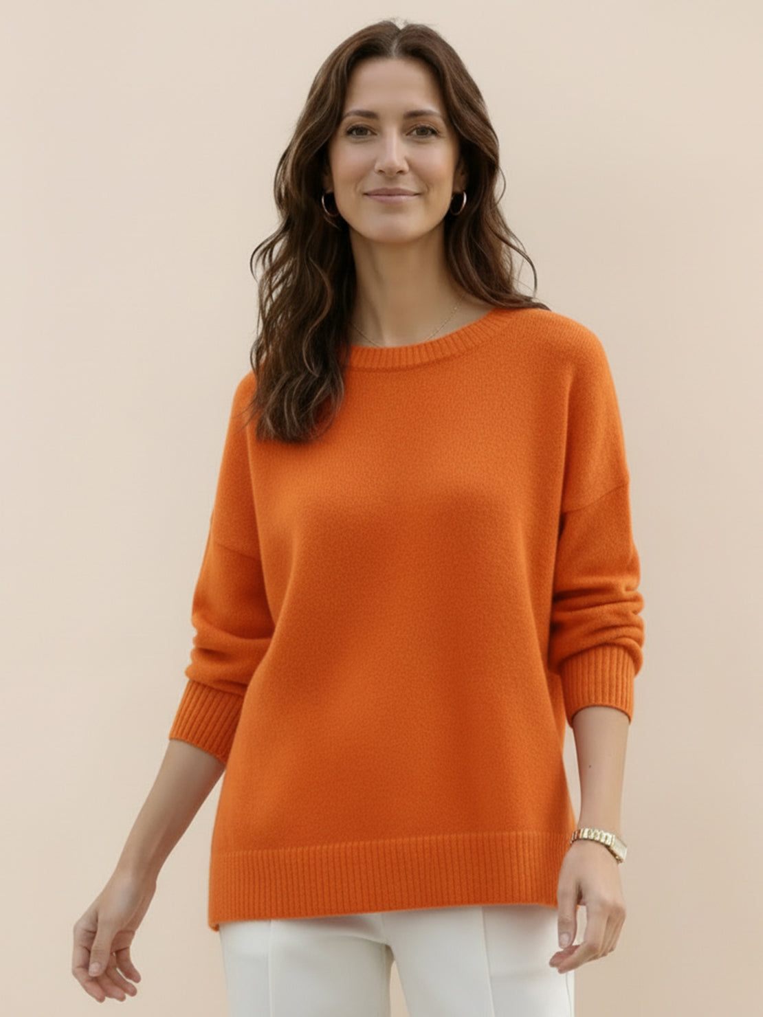 Oversized crew neck knit sweater with dropped shoulders and ribbed cuffs in neutral color