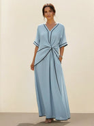 Knot-waist maxi dress with V-neckline and flowing skirt in lightweight fabric