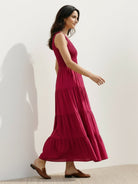 Smocked sleeveless maxi dress with scoop neckline and tiered skirt in lightweight breathable fabric