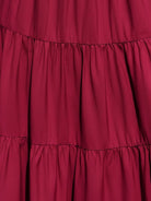 Smocked sleeveless maxi dress with tiered skirt and scoop neckline