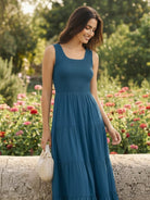 Smocked sleeveless maxi dress with tiered skirt and scoop neckline in lightweight fabric