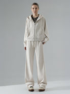 Chenille zip-up loungewear set with hoodie and wide-leg pants in soft, subtle sheen fabric