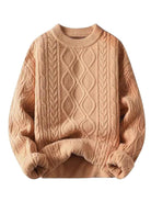Oversized cable-knit crewneck sweater with dropped shoulders and ribbed cuffs in a thick, textured knit