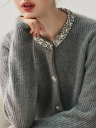 100% Alashan cashmere diamond-collar cardigan with crystal buttons and ribbed knit design