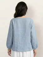 Cotton-linen embroidered blouse with 3/4 balloon sleeves and tonal floral detail