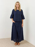 Two-piece 100% cotton wrap skirt and hip-length top set with crinkle texture and elastic waistband