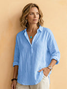 Lightweight 100% cotton popover blouse with relaxed oversized fit and classic collar
