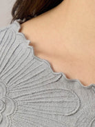 Lightweight Floral Jacquard Pleated Top with flutter sleeves and 3D floral texture in relaxed A-line fit